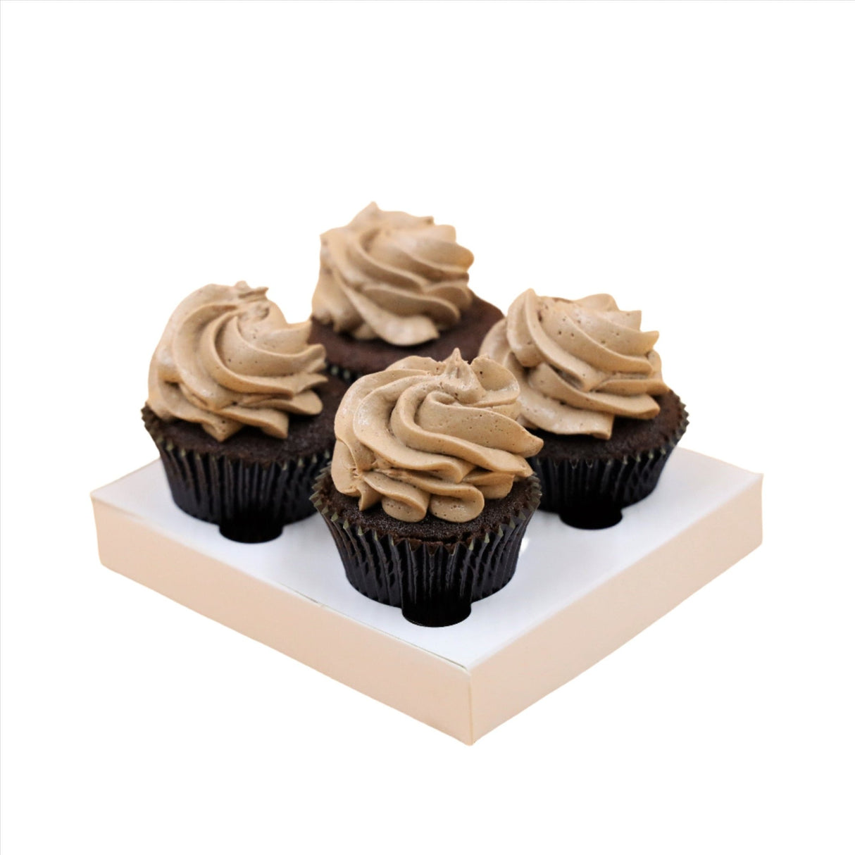 four chocolate mud cupcakes on a cardboard delivery tray