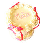 Vintage heart ribbon buttercream party cake with 'Maize' written on it.