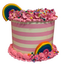 Colorful striped cake with pink frosting, rainbow decorations, and candy on a white background