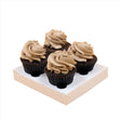 four chocolate mud cupcakes on a cardboard delivery tray