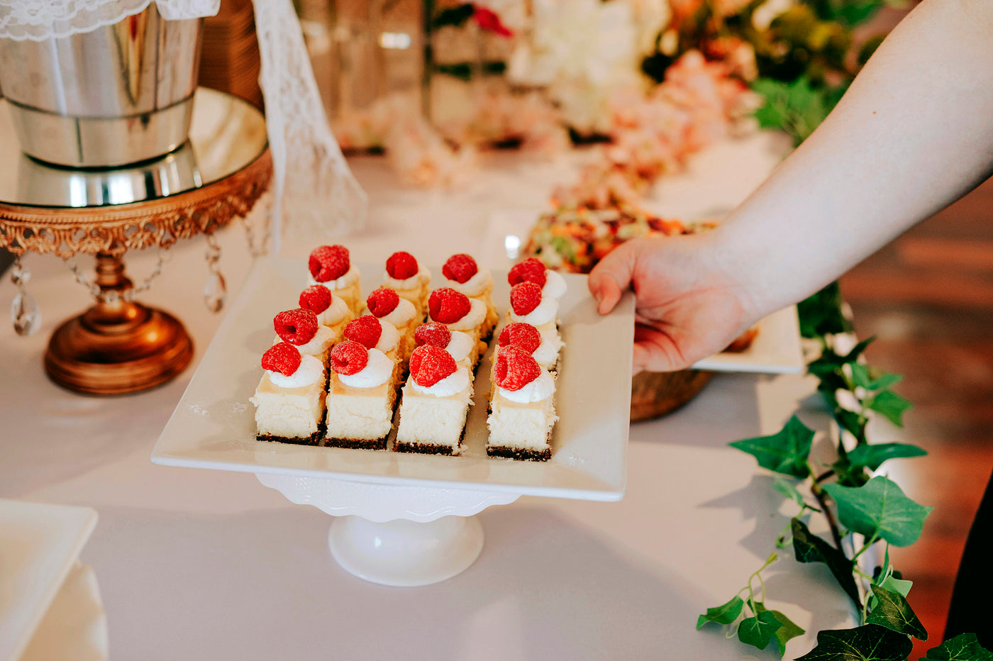 mini desserts on a cake and treats table